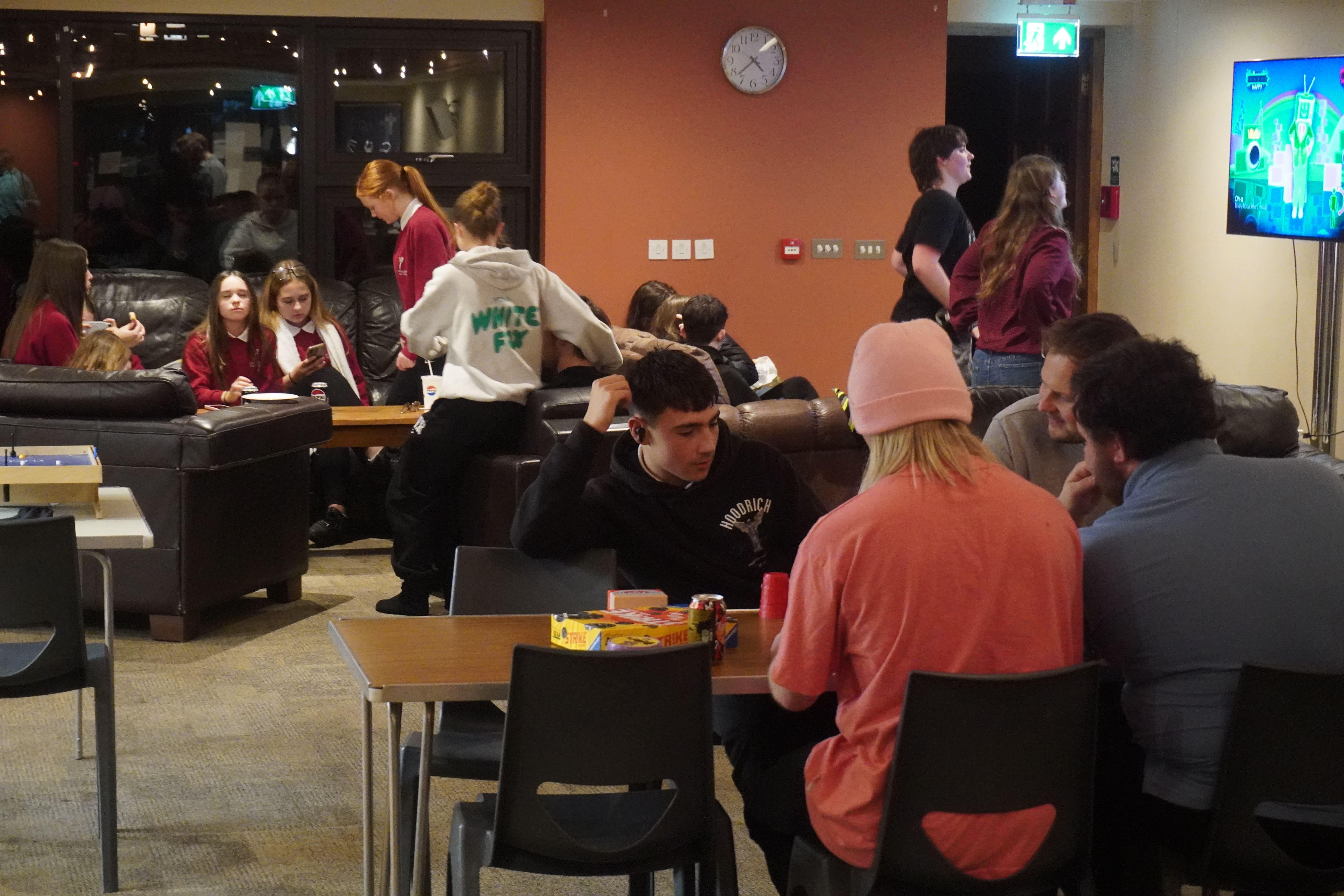 Group of young adults in St Augustine's youth cafe 
